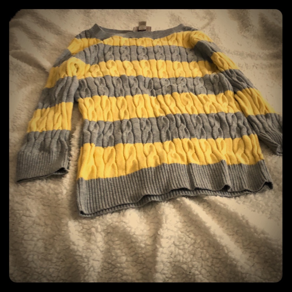 Cute sweater. 3/4 of a sleeve.